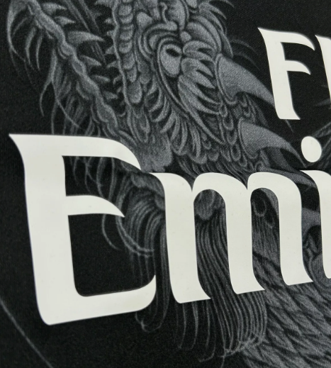 Close-up view of the dragon design on the Real Madrid Dragon Jersey, showcasing intricate artwork